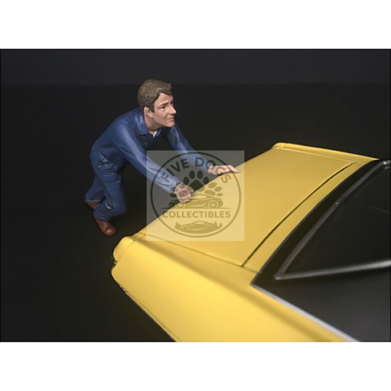 mechanic darwin pushing a car figurine for 1/24 scale models by american diorama