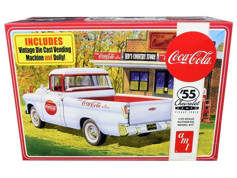 Vintage Coca-Cola delivery truck die-cast model with vending machine and doll Vintage Coca-Cola die-cast truck with vending machine and doll, collectible toy from Five Dogs Colle.
