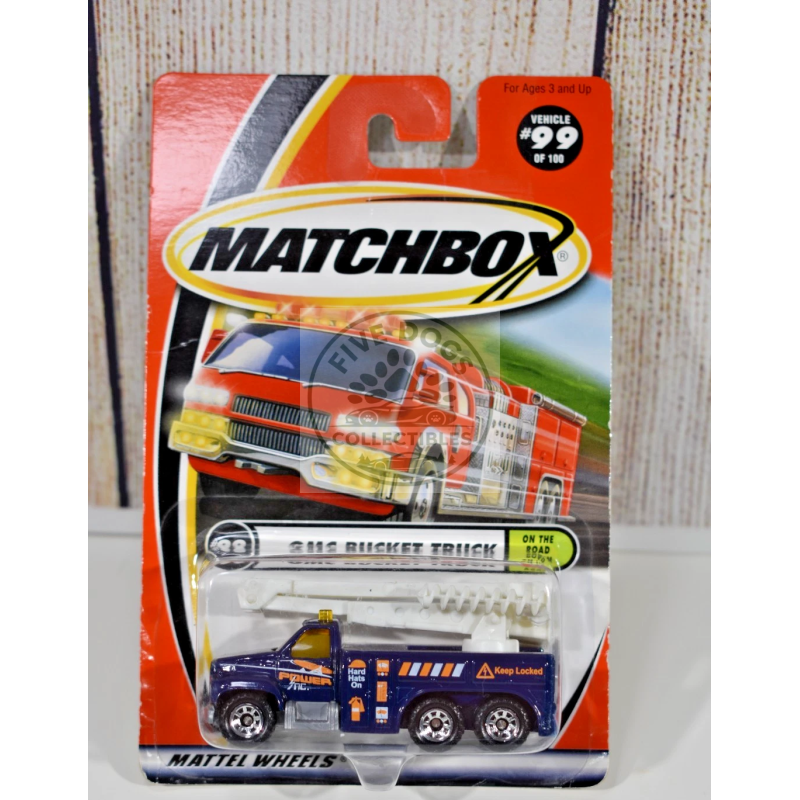 matchbox gmc bucket truck on the road
