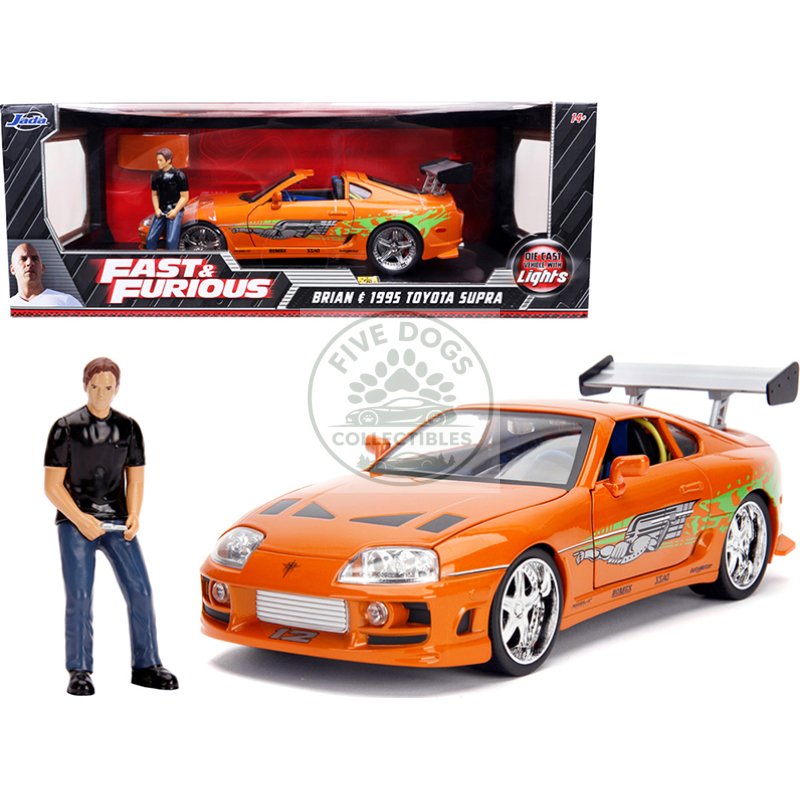 1995 toyota supra orange metallic with lights and brian figurine "fast & furious" movie 1/18 diecast model car by jada