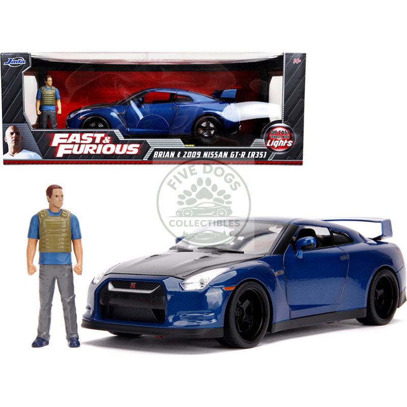 2009 nissan gt r (r35) blue metallic and carbon with lights and brian figurine "fast & furious" movie 1/18 diecast model car by jada