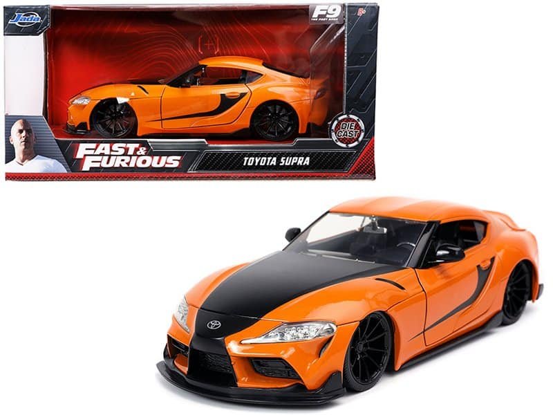 High-Performance Toy Car Model Fast and Furious Toyota Supra die-cast collectible toy car in orange and black.