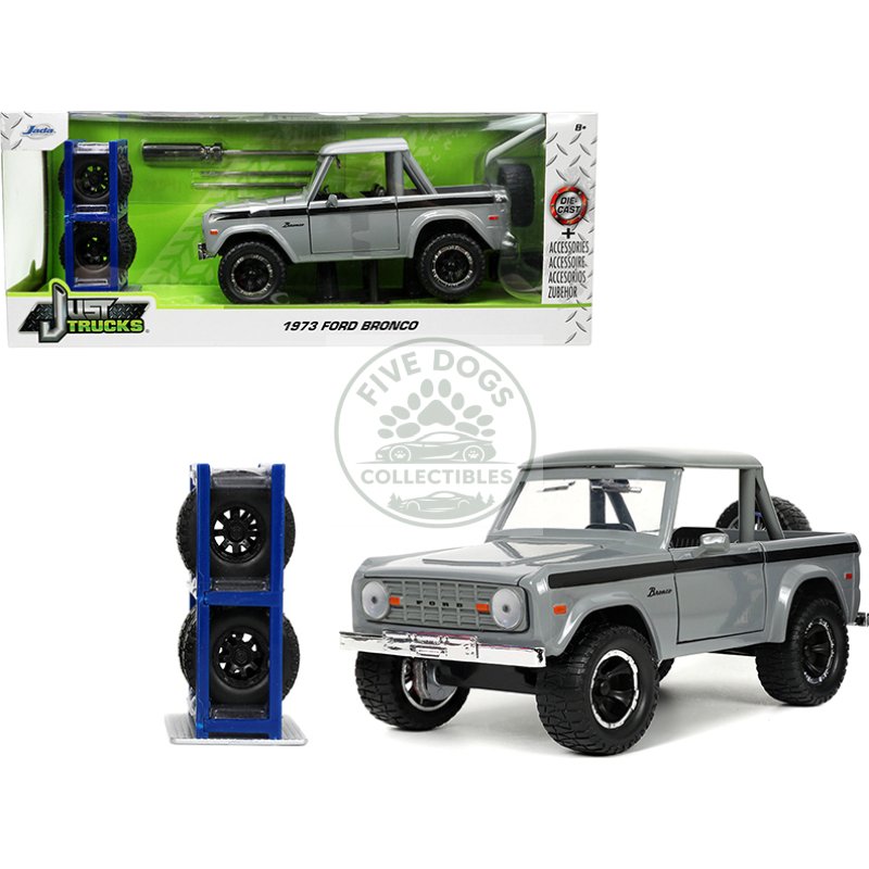 1973 ford bronco pickup truck gray with black stripes with extra wheels "just trucks" series 1/24 diecast model car by jada