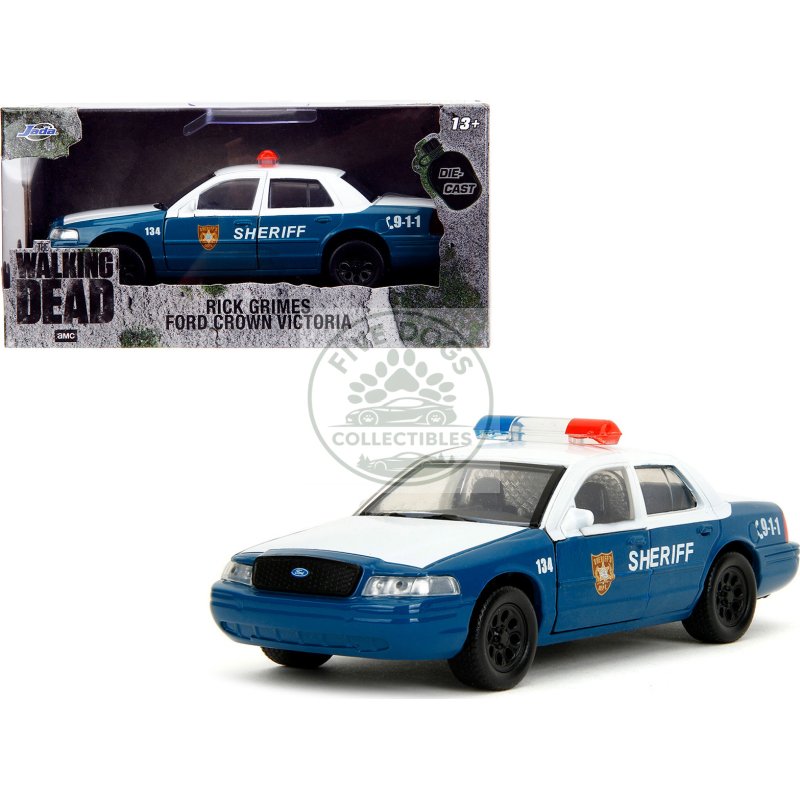 rick grimes' ford crown victoria "sheriff" blue and white "the walking dead" (2010 2022) tv series "hollywood rides" series 1/32 diecast model car by jada