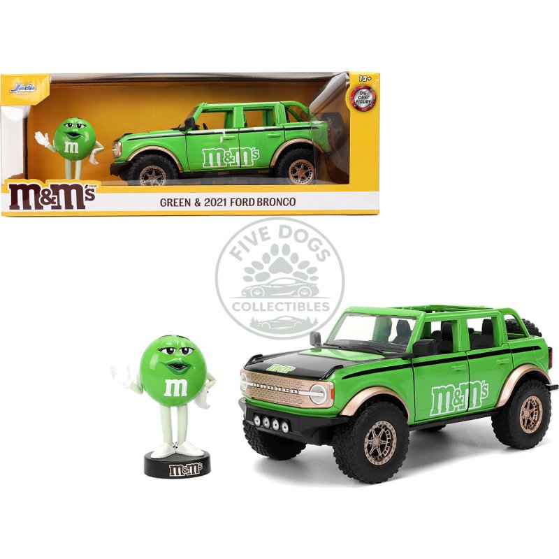 2021 ford bronco green with black stripes and green m&m's diecast figure "hollywood rides" series 1/24 diecast model car by jada