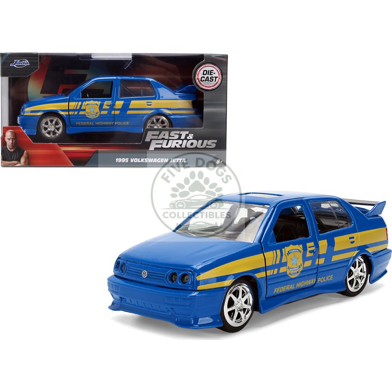 volkswagen jetta police vehicle "rio federal highway police" blue with yellow stripes "fast five" (2011) movie "fast & furious" series 1/32 diecast model car by jada