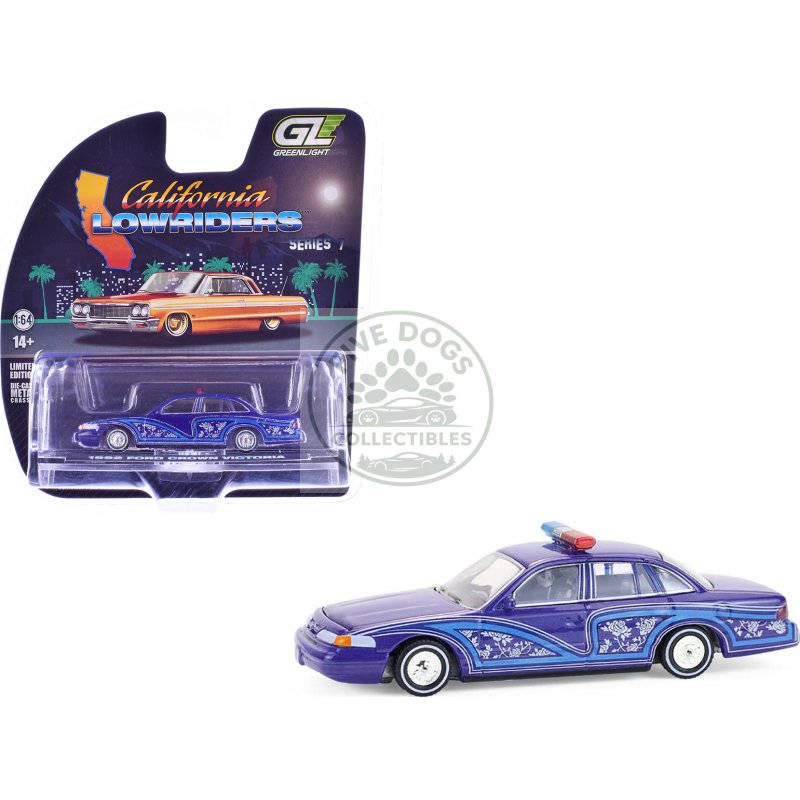 1992 ford crown victoria lowrider blue with graphics and lightbar "california lowriders" series 7 1/64 diecast model car by greenlight