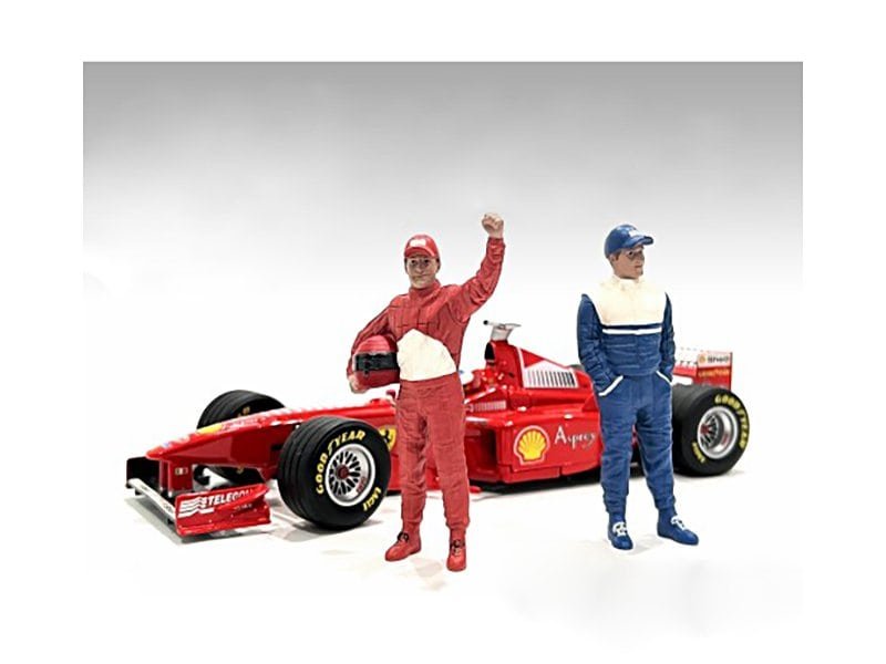 Formula 1 Race Car with Two Toy Drivers Red Formula 1 race car with two toy drivers in racing suits and helmets.