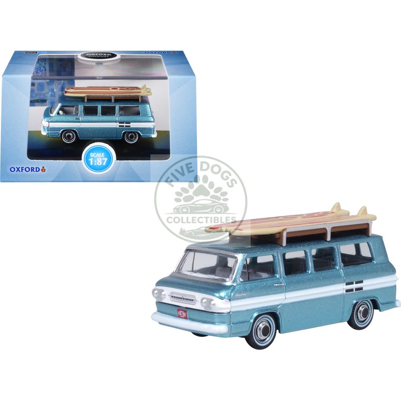 1961 chevrolet corvair greenbrier passenger wagon van turquoise metallic and cameo white with surfboards on roof 1/87 (ho) scale diecast model car by oxford diecast