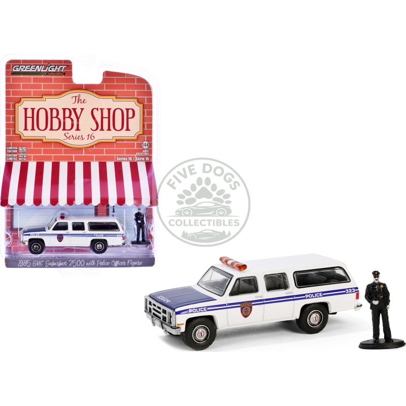 1985 gmc suburban 2500 "new york city transit police department" white with blue stripes and police officer figure "the hobby shop" series 16 1/64 diecast model car by greenlight