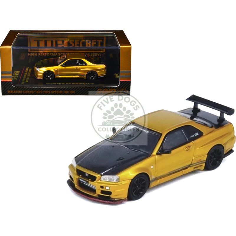 nissan skyline gt r (r34) "top secret" rhd (right hand drive) gold metallic with carbon hood and trunk "tokyo auto salon 2024 malaysia diecast expo 2024" 1/64 diecast model car by inno models