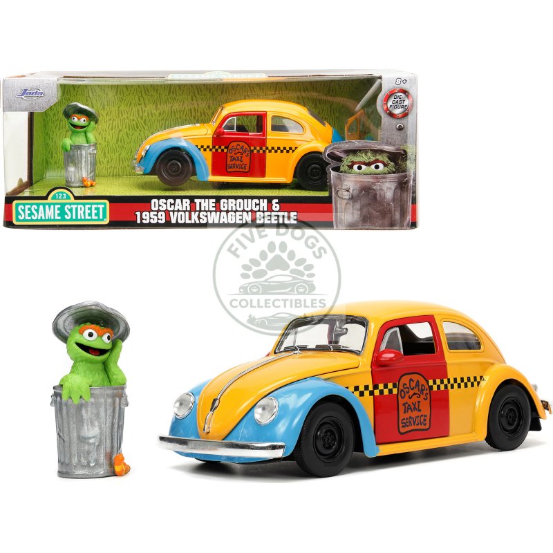 1959 volkswagen beetle taxi yellow and blue "oscar's taxi service" and oscar the grouch diecast figure "sesame street" "hollywood rides" series 1/24 diecast model car by jada