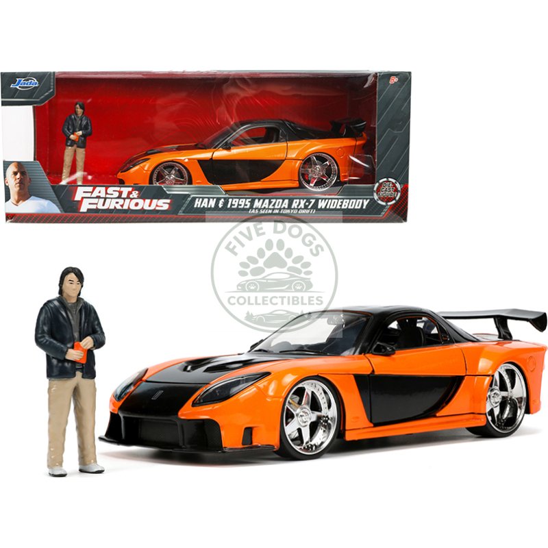 1995 mazda rx 7 widebody rhd (right hand drive) orange metallic and black with han diecast figurine "the fast and the furious: tokyo drift" (2006) movie 1/24 diecast model car by jada