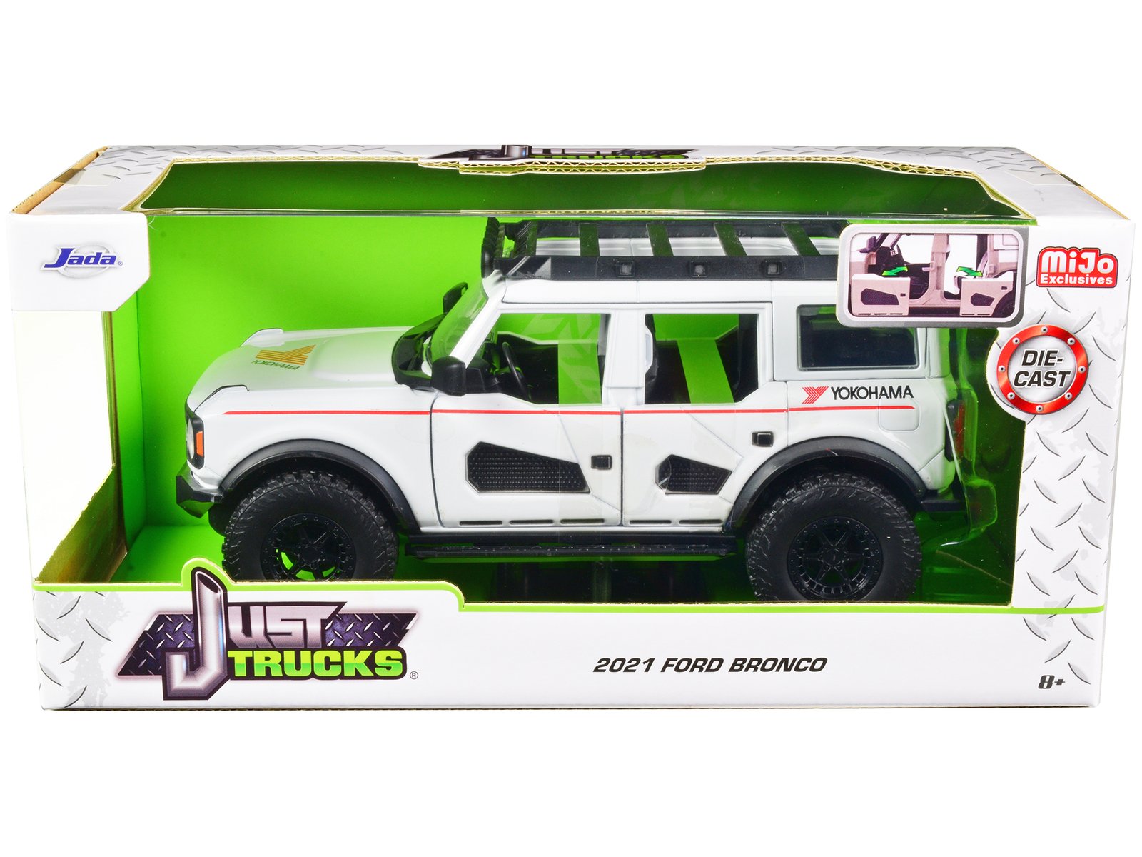 2021 ford bronco white with red stripes and roof rack "yokohama tires" "just trucks" series 1/24 diecast model car by jada 2021 ford bronco white with red stripes and roof rack "yokohama tires" "just trucks" series 1/24 diecast model car by jada