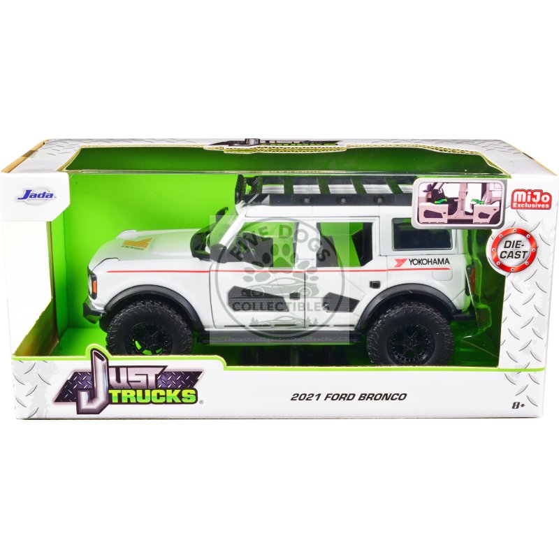 2021 ford bronco white with red stripes and roof rack "yokohama tires" "just trucks" series 1/24 diecast model car by jada