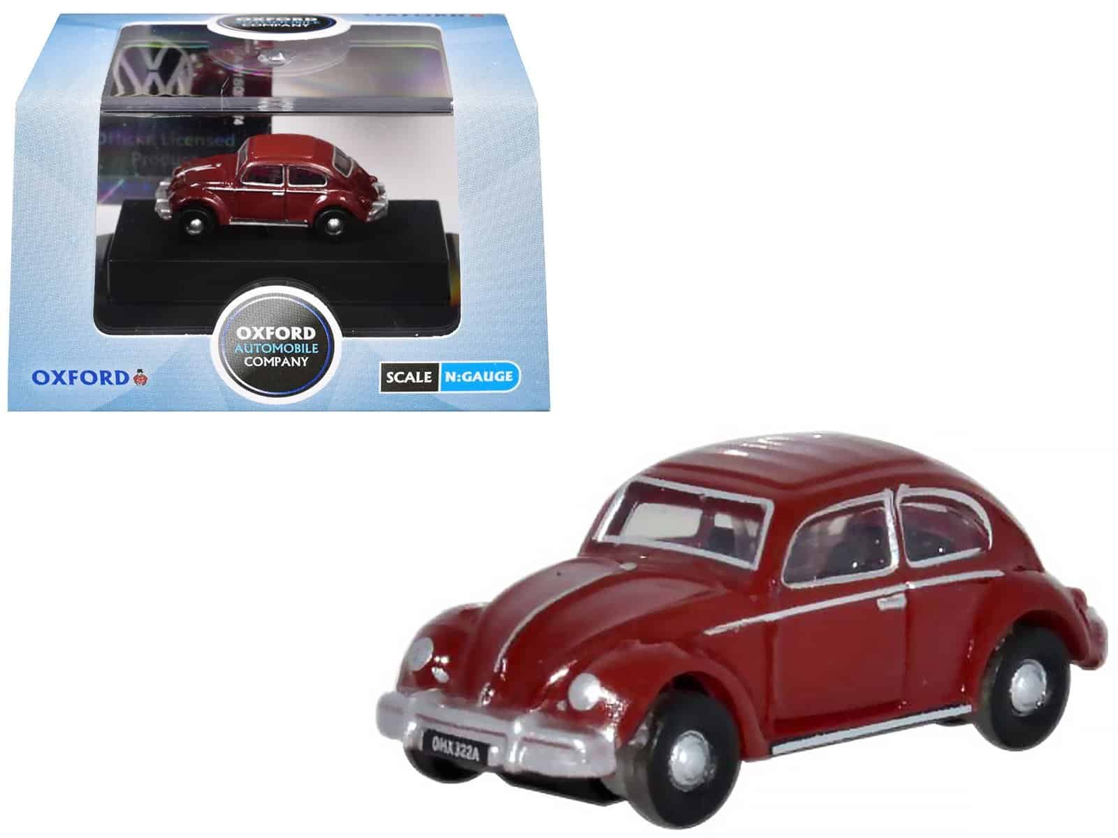 Vintage Red Toy Car - Oxford Diecast Model Red vintage toy car model by Oxford Diecast, detailed miniature collectible.