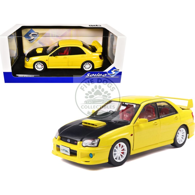 2003 subaru impreza wrx sti rhd (right hand drive) yellow with carbon hood 1/18 diecast model car by solido