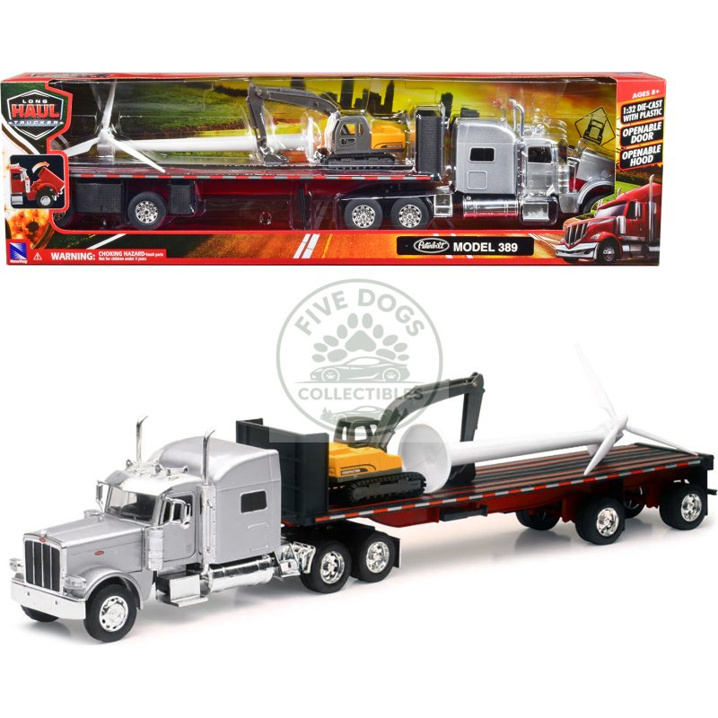 peterbilt 389 truck with flatbed trailer silver metallic with excavator and wind turbine "long haul truckers" series 1/32 diecast model by new ray