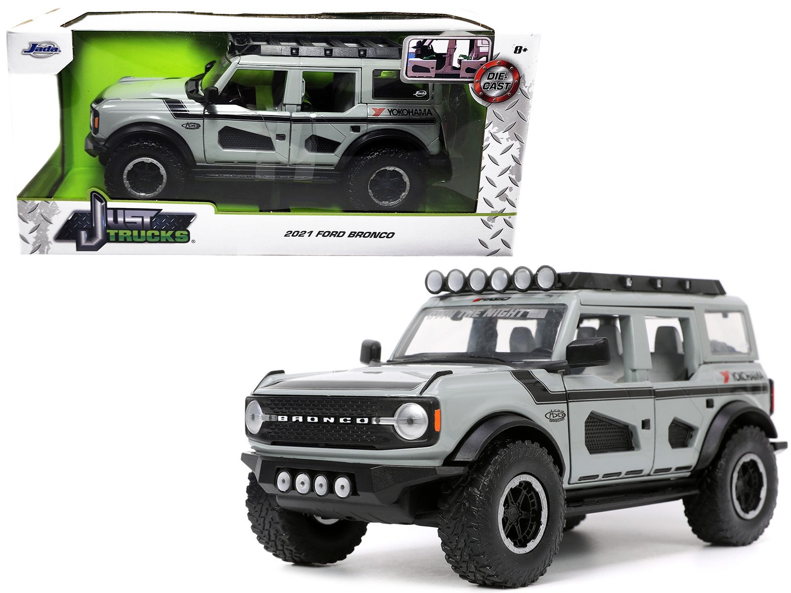 2021 ford bronco gray with black stripes with roof rack "own the night" "just trucks" series 1/24 diecast model car by jada 2021 ford bronco gray with black stripes with roof rack "own the night" "just trucks" series 1/24 diecast model car by jada