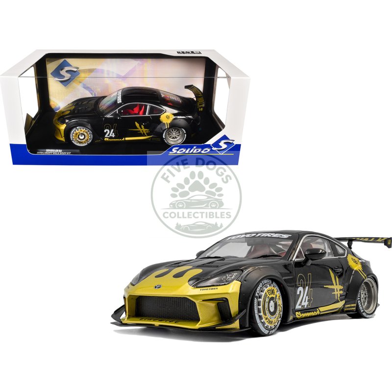 2024 toyota gr86 liberty walk body kit rhd (right hand drive) #24 black with gold graphics 1/18 diecast model car by solido